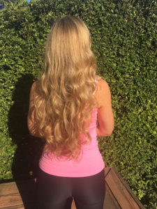 Hair Cut and Color Client with Long Wavy Blond Hair