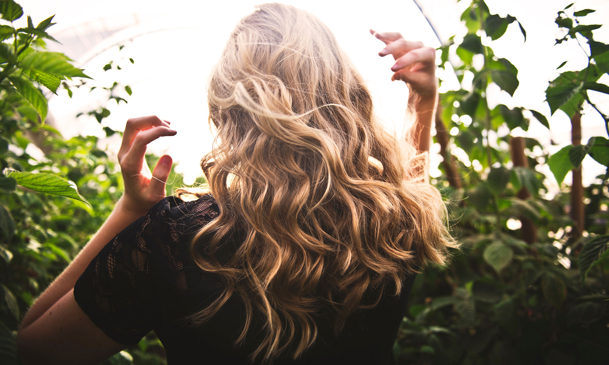 Woman Outside with Long, Wavy, Blond Hair